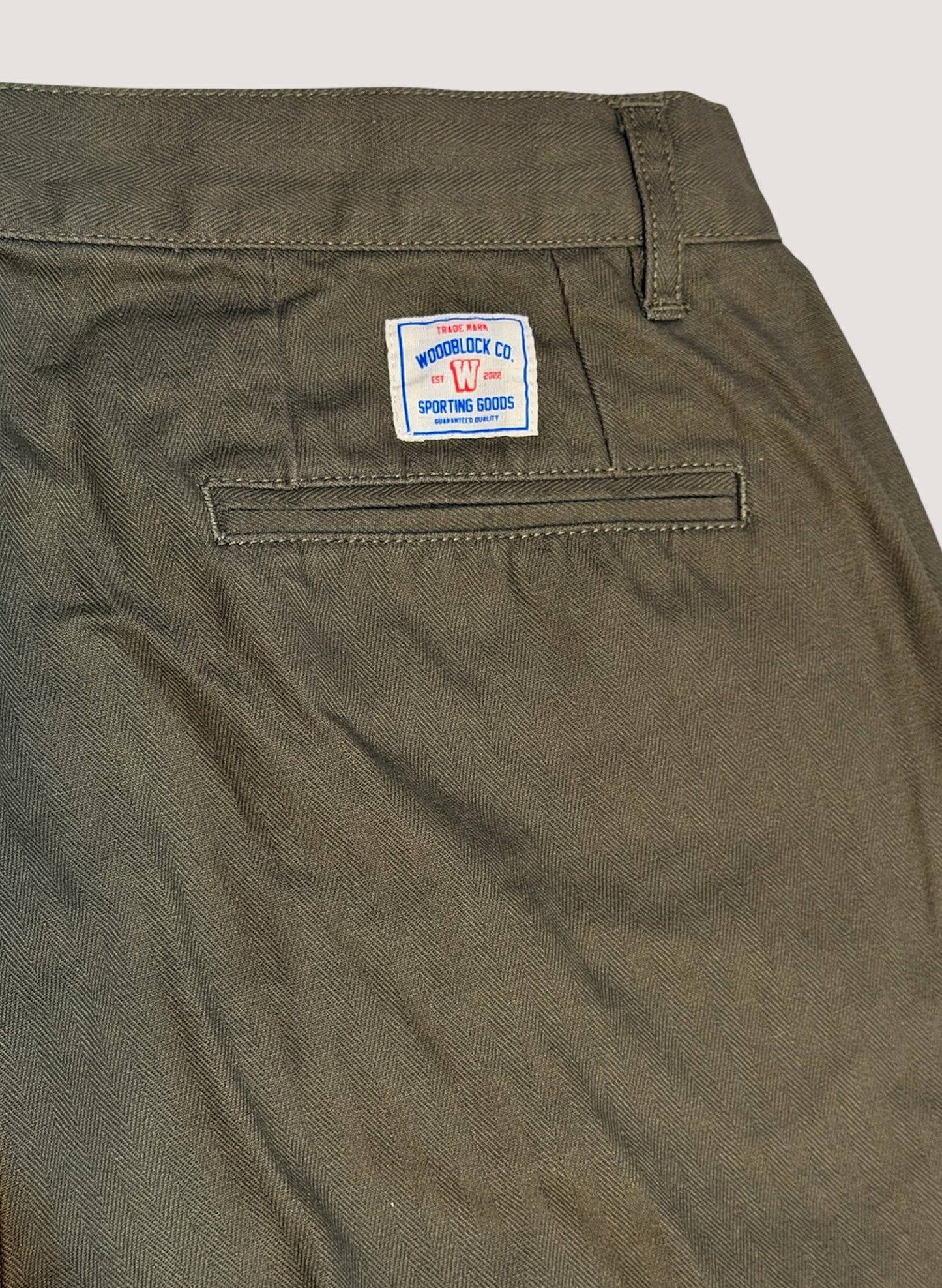 WOODBLOCK２TUCK HERRINGBONE TROUSER OLIVE (WB-25AW-005)